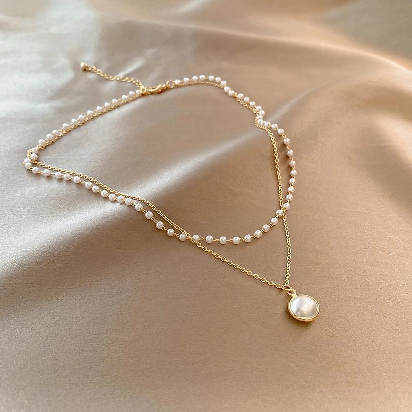 conjunto de colar feminino de ouro 18k banhado a aço titânio multicamadas de pérolas brancas pura elegância.