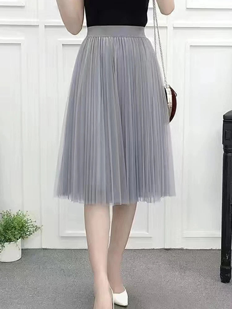 Saia de tule feminina elegante, plissada cintura alta.
