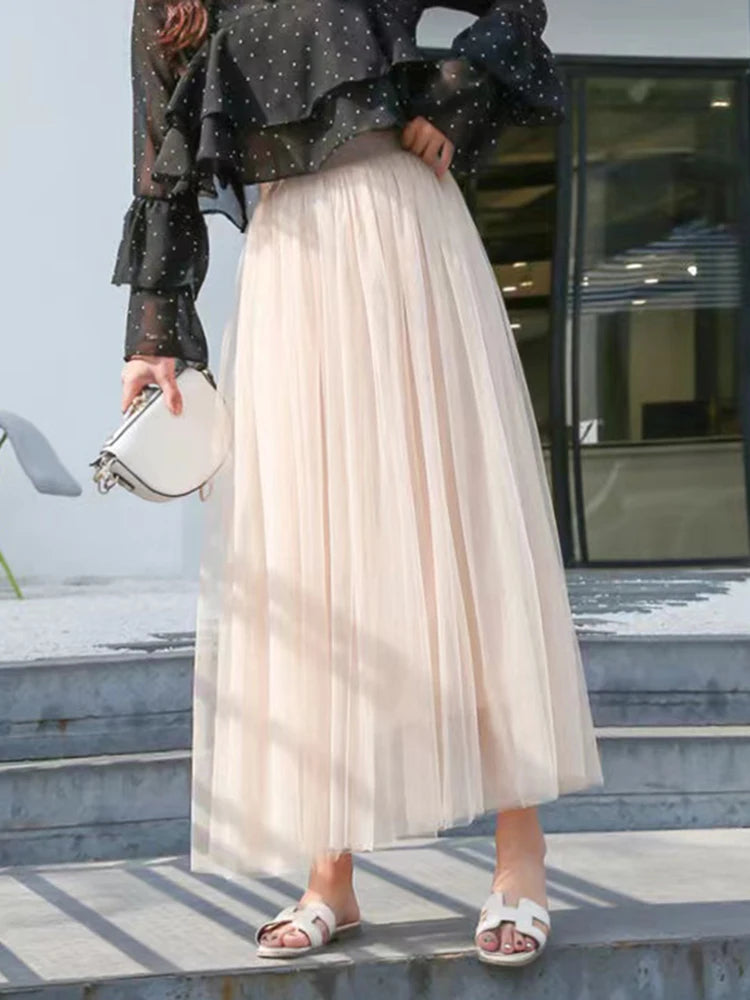 Saia de tule feminina elegante, plissada cintura alta.