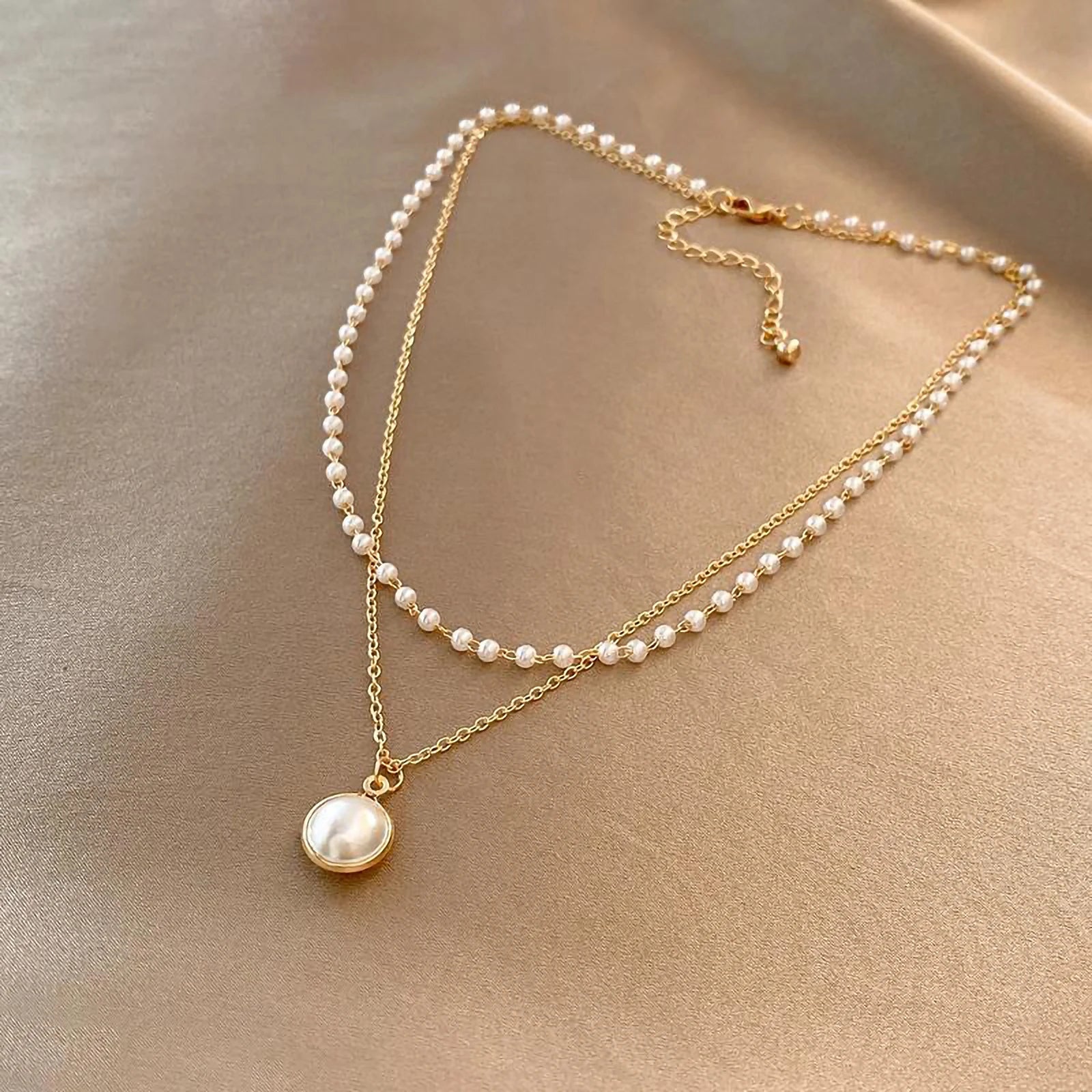 conjunto de colar feminino de ouro 18k banhado a aço titânio multicamadas de pérolas brancas pura elegância.