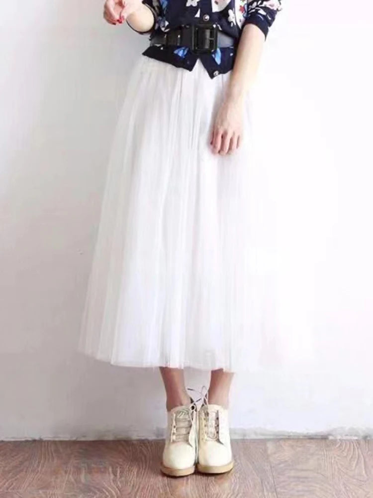 Saia de tule feminina elegante, plissada cintura alta.