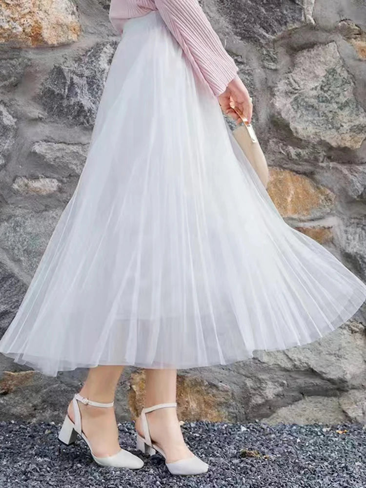 Saia de tule feminina elegante, plissada cintura alta.