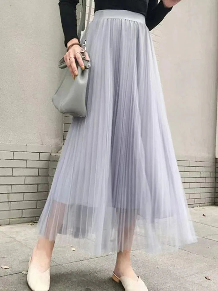 Saia de tule feminina elegante, plissada cintura alta.