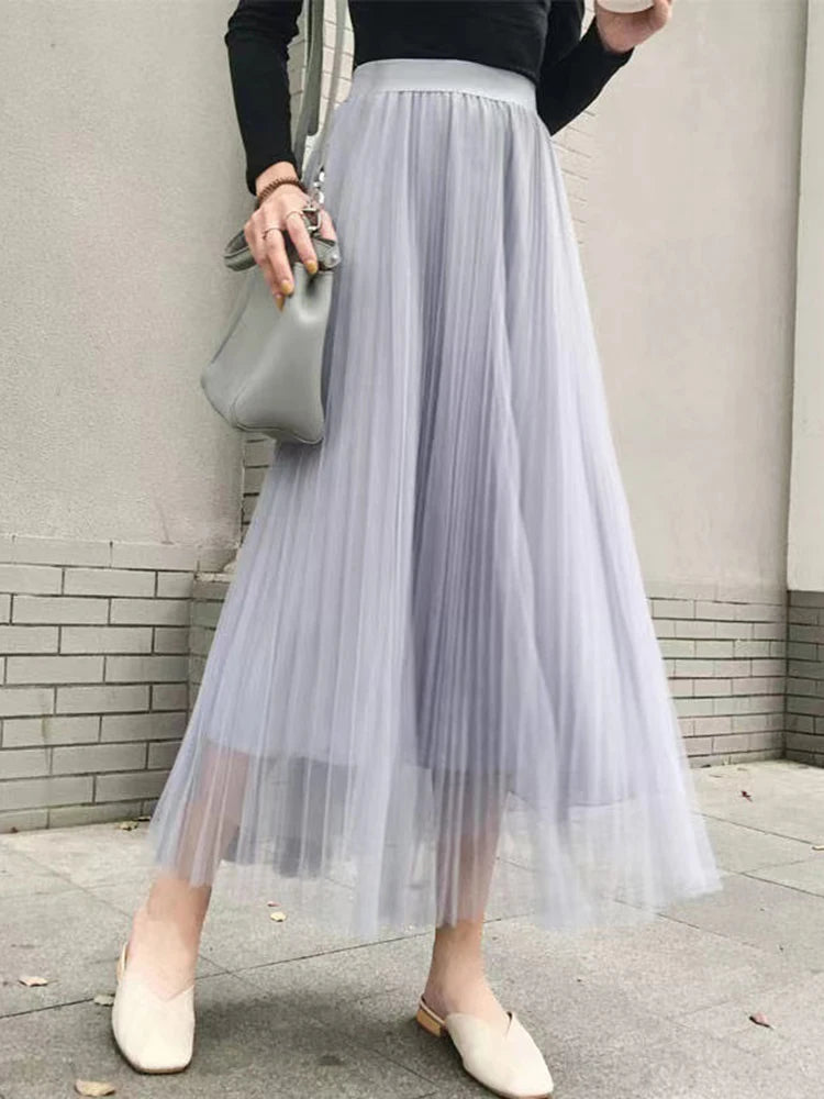 Saia de tule feminina elegante, plissada cintura alta.