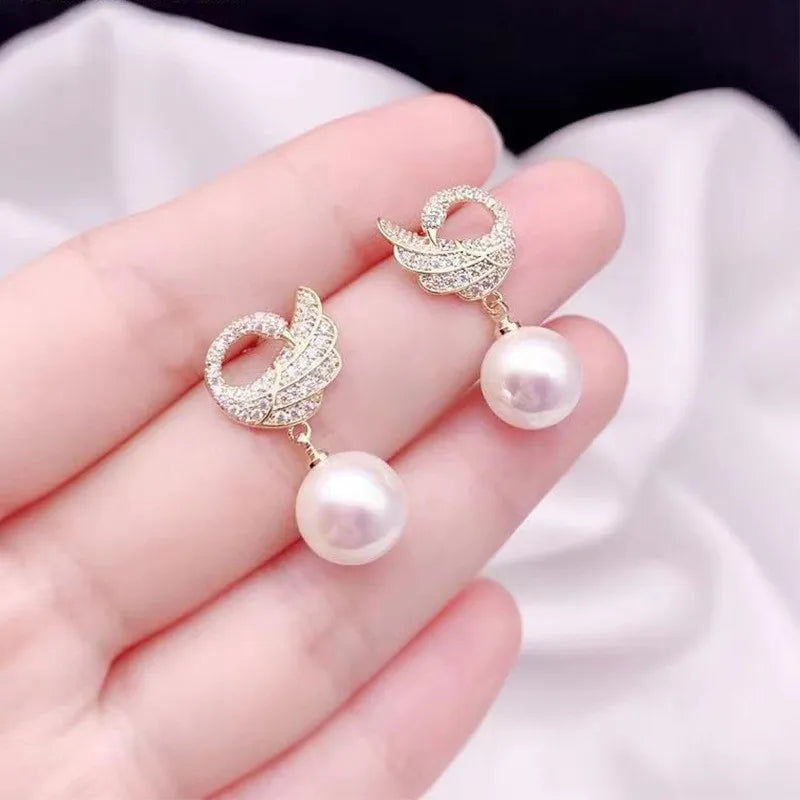 Brincos de cisne de cristal com agulha de prata , moda feminina  brincos de pérola elegantes.