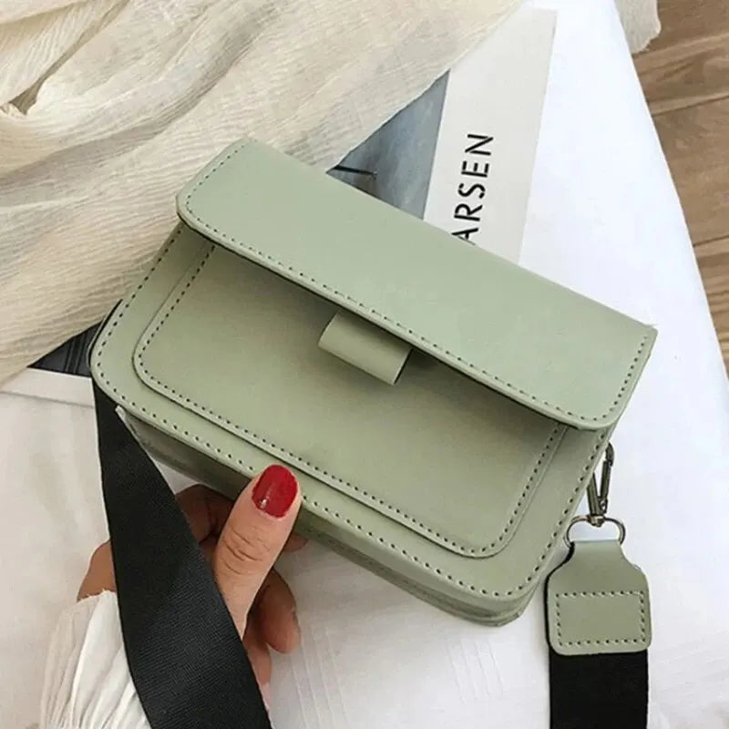 Bolsa transversal feminino ótima para viagem passeio reuniões com alça bolsa pequena.