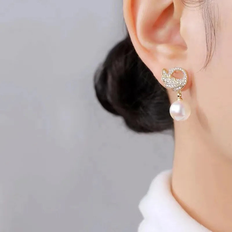 Brincos de cisne de cristal com agulha de prata , moda feminina  brincos de pérola elegantes.