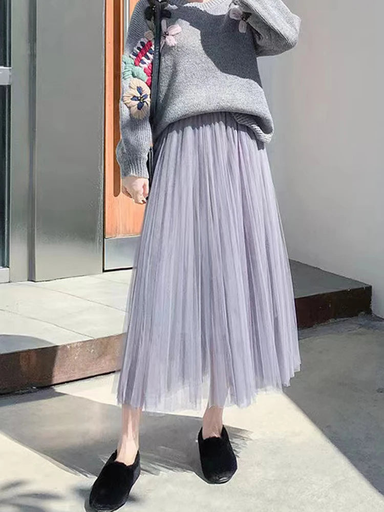 Saia de tule feminina elegante, plissada cintura alta.