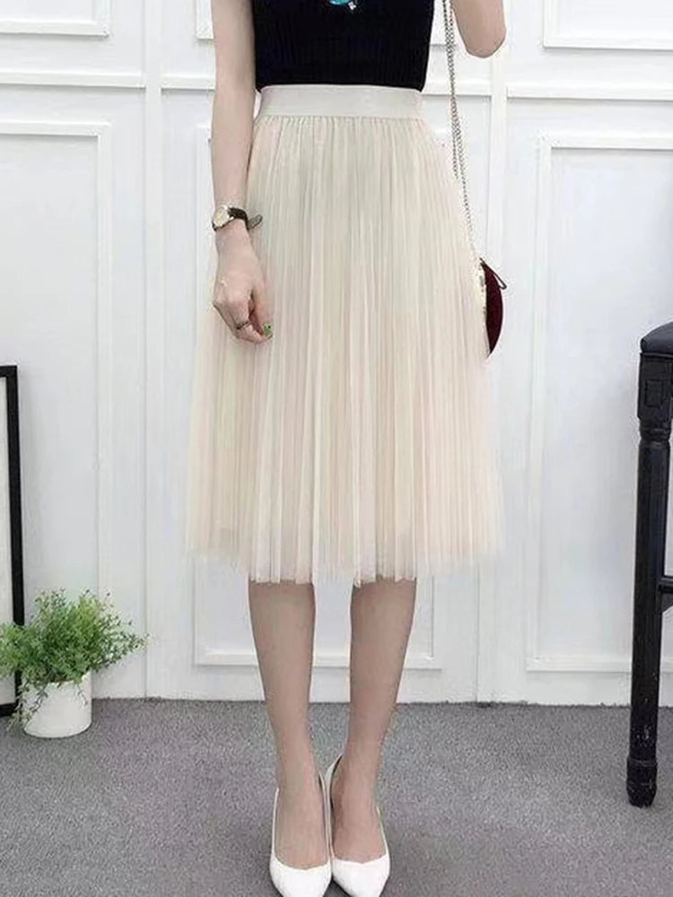 Saia de tule feminina elegante, plissada cintura alta.